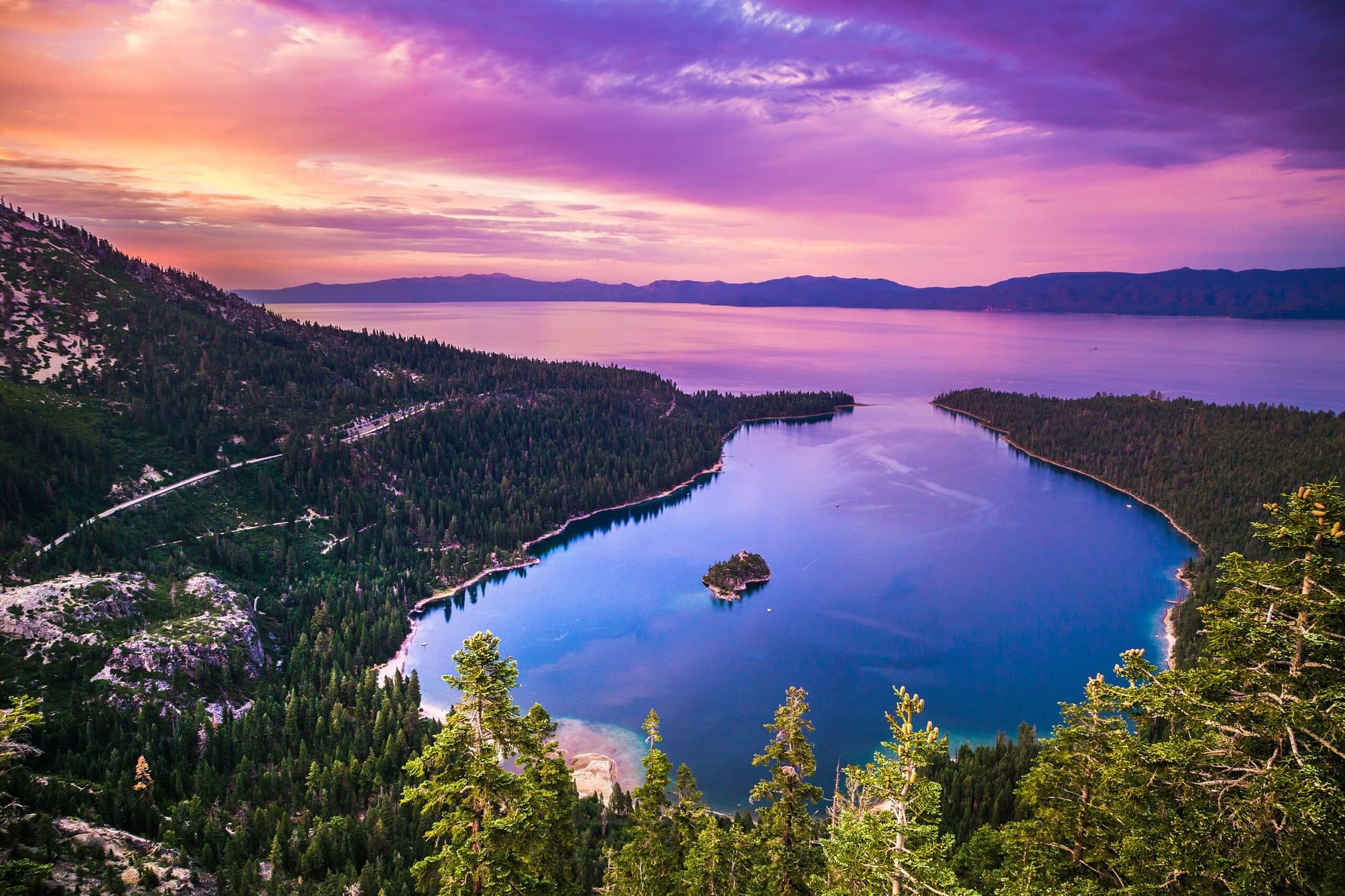 Emerald Bay under a pink and purple sunset